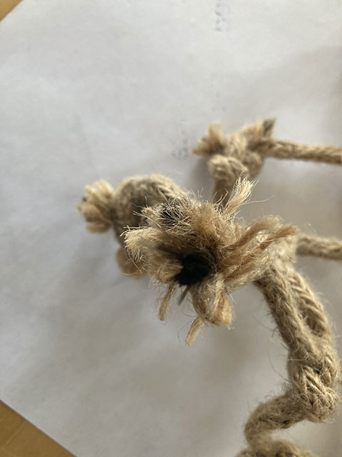 Detailaufnahme der Filamente aus Basaltfasern und der Baumwollumhüllung